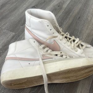 Pink and white Nike blazers